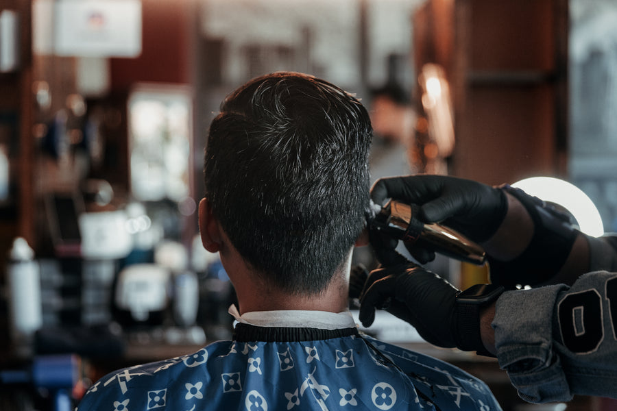 Customer getting hair trimmed