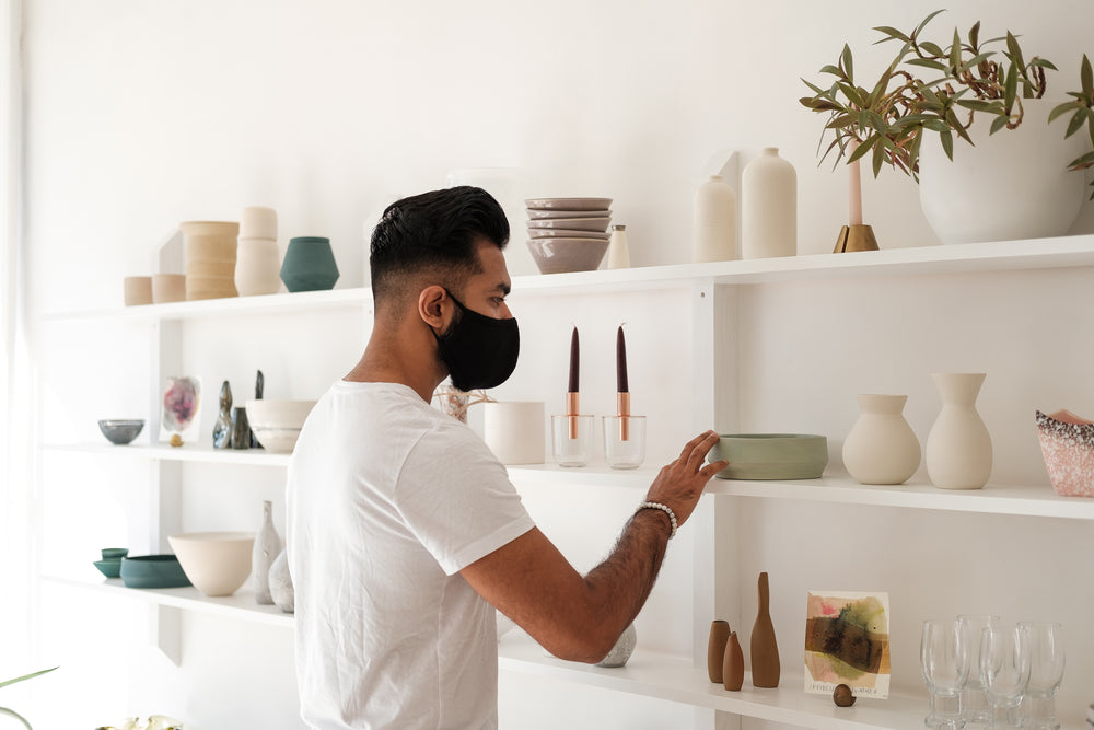 customer peruses retail store merchandise