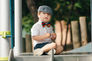 cute toddler in rainbow bowtie