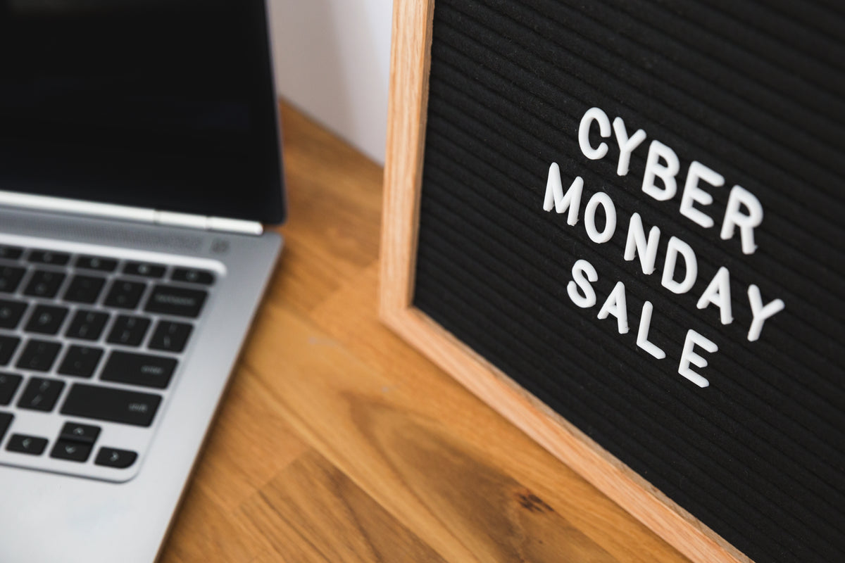 cyber monday sale sign by computer