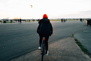 cyclist with red hat