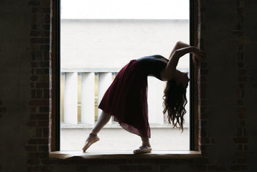 Free Dancer Bends Back In Window Photo — High Res Pictures