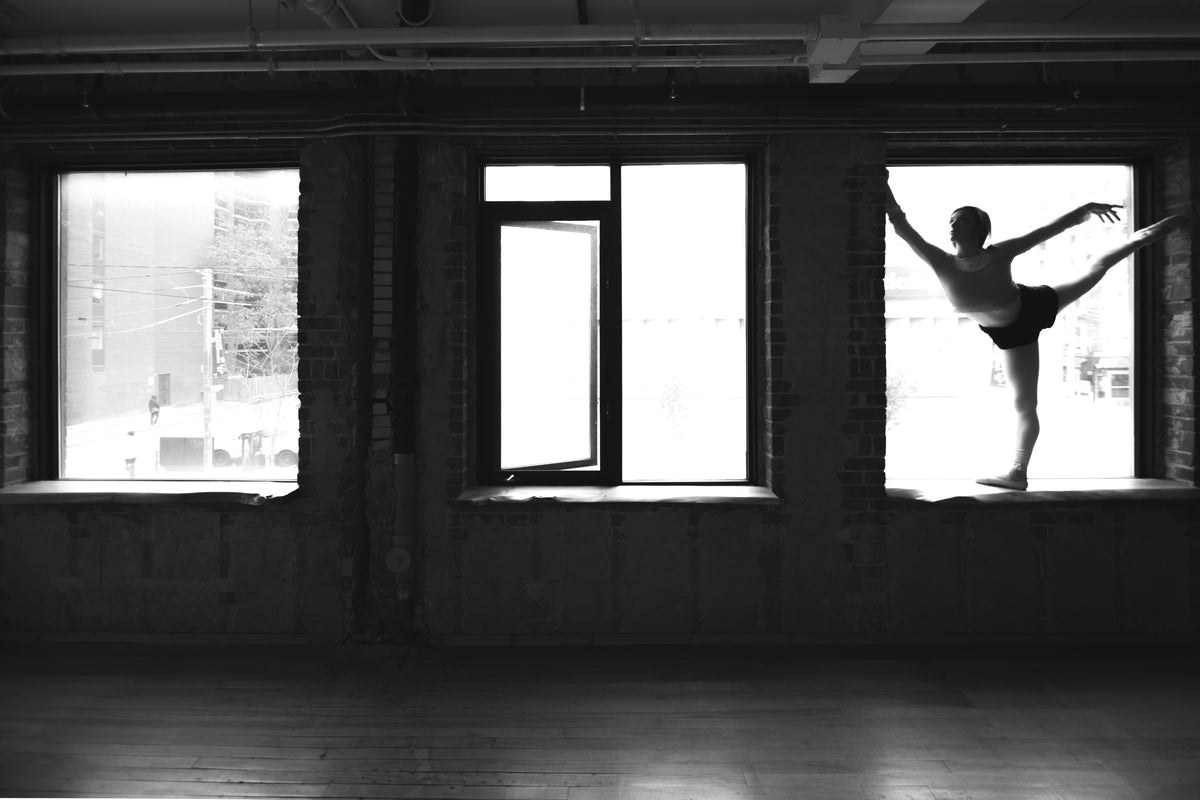 dancer in studio wondows