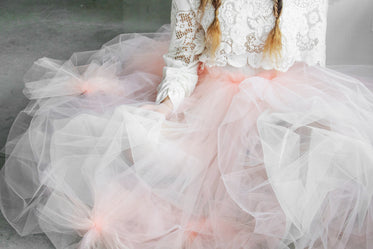 dancer in tutu sitting