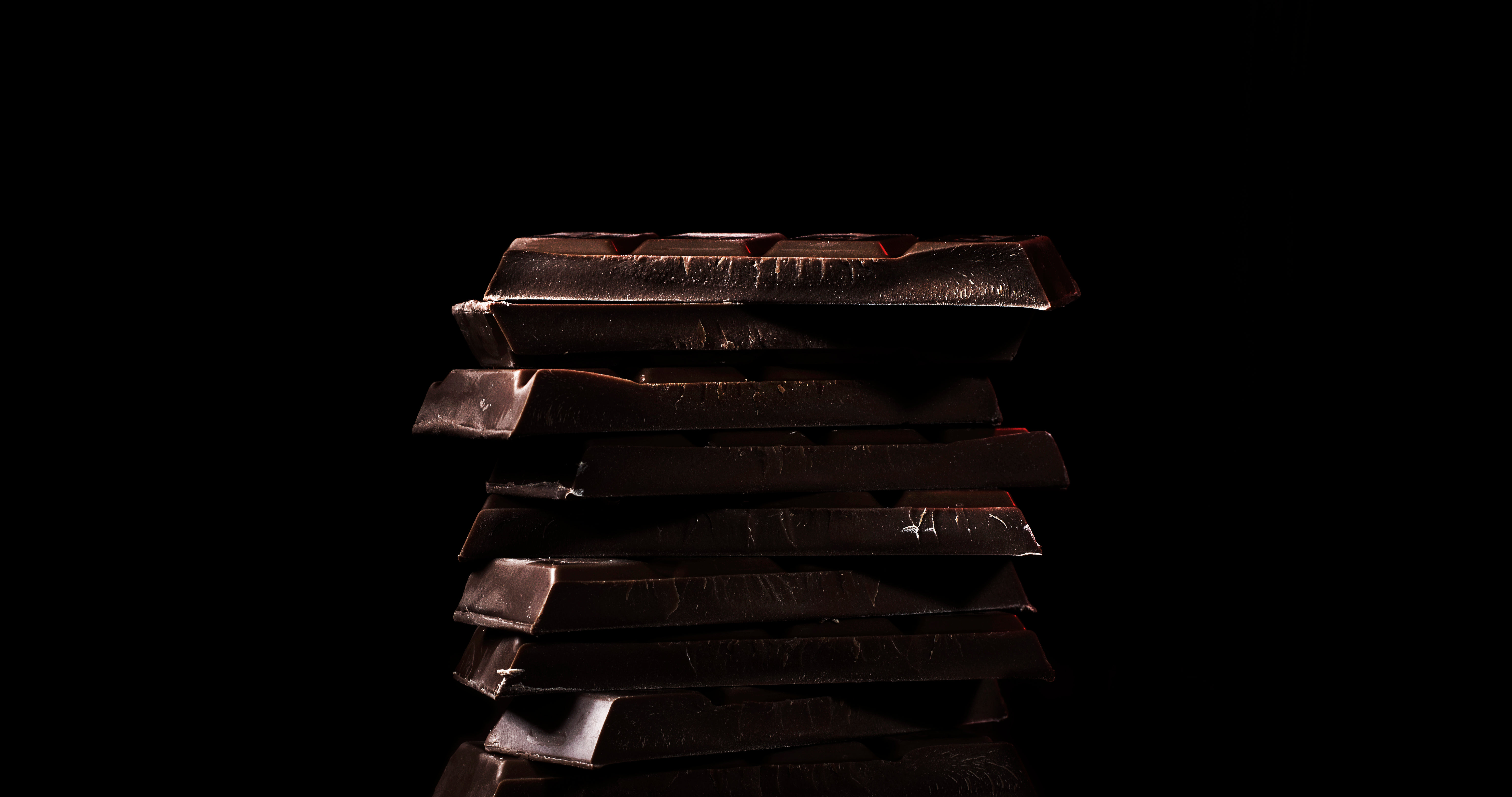 Decadent chocolate blocks, Close-up of indulgent dark chocolate bar  segments Vertical Mobile Wallpaper AI Generated 30315616 Stock Photo at  Vecteezy