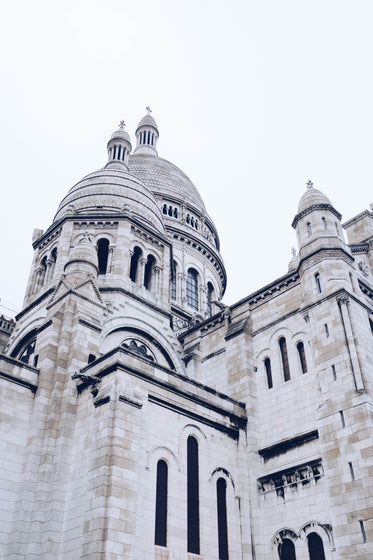 dark windows in the face of a cathedral