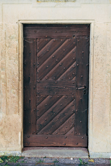 dark wood doorway with white frame