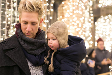 daughter and father at christmas market