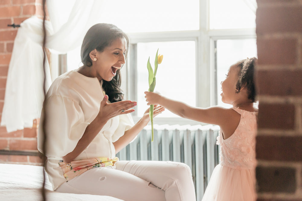 daughter suprises mom with tulip