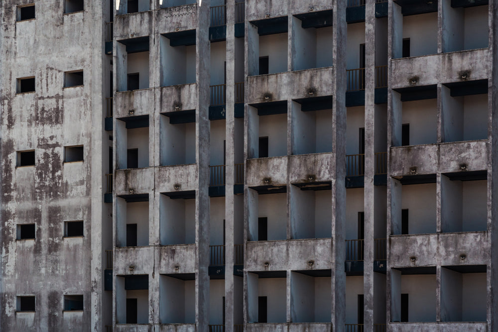 decaying gray building