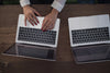 delicate hands using laptops