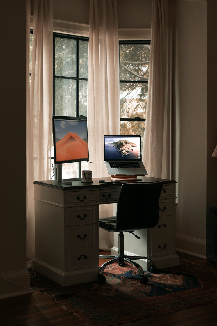 desk-sits-by-the-window-in-a-home-office