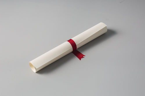 diploma with red ribbon