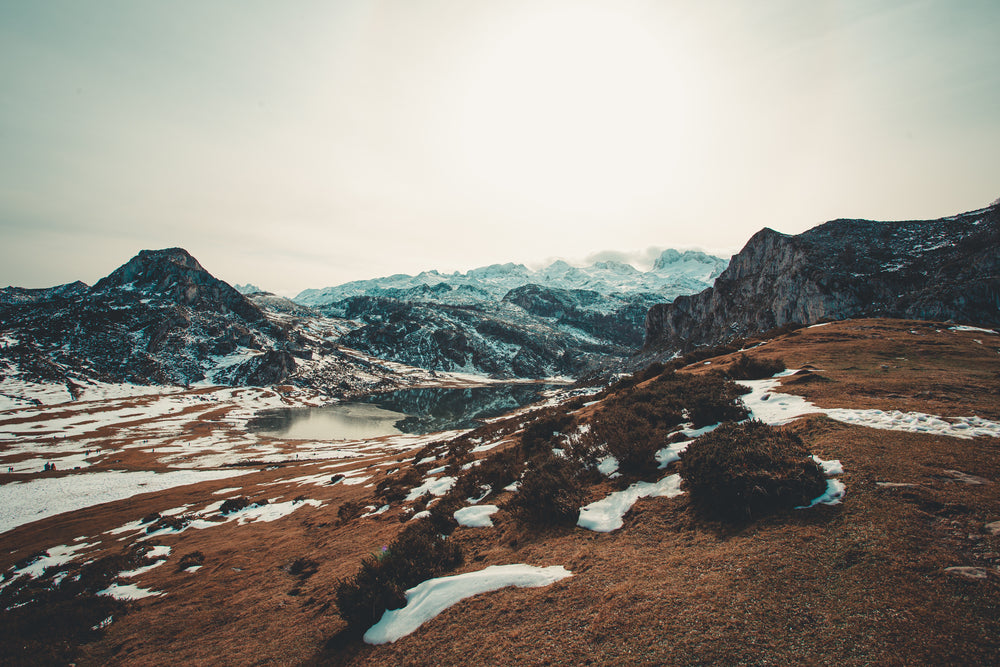 distant hikers on mountaineous landscape