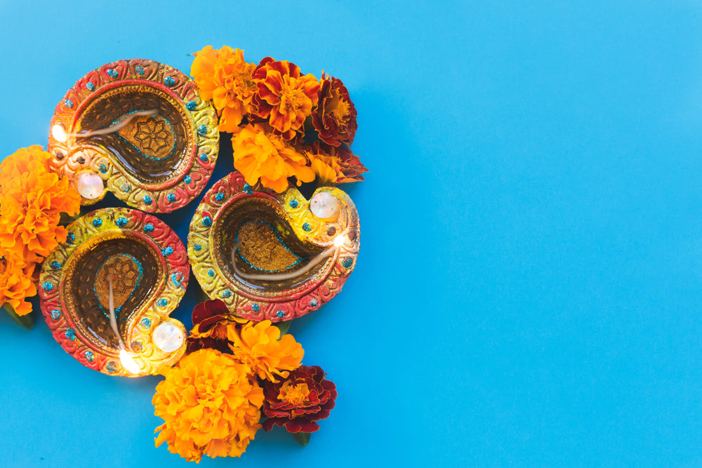 diwali diya on blue