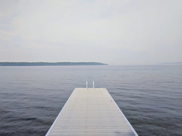 dock reaching to lake