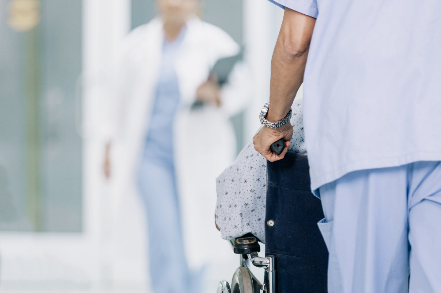 Doctor Approaches Patient