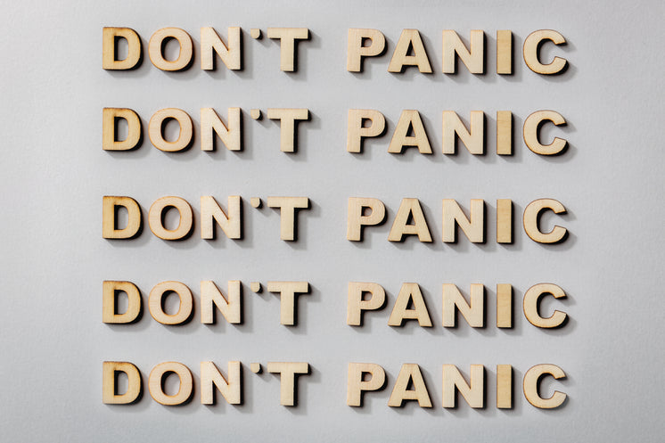 Don't Panic Statement In Wooden Letters