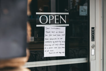 door with social distance instructions