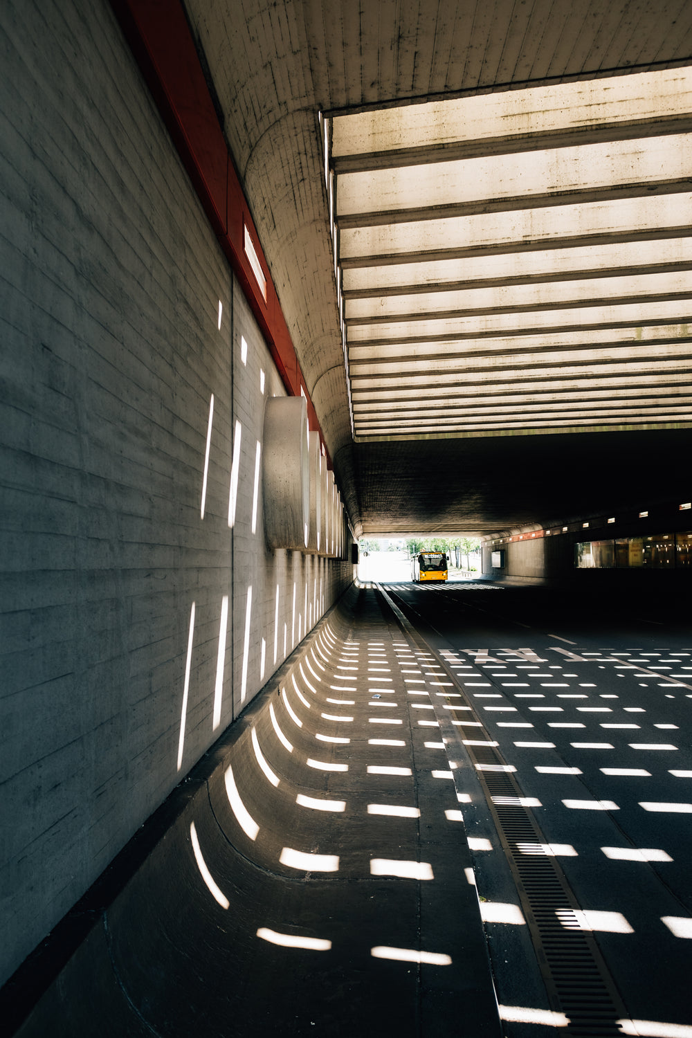 dotted lines in a tunnel with light