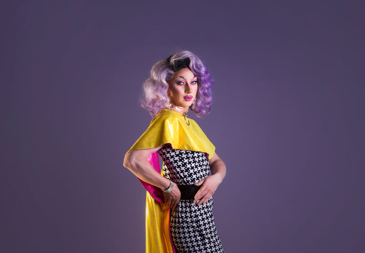 drag-performer-with-purple-wig-twists.jpg?width=746&format=pjpg&exif=0&iptc=0