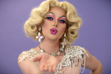 drag queen blowing a kiss