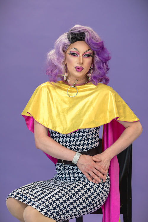 drag queen purple hair and background portrait