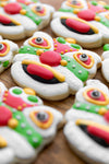 dragon cookies with red white and green icing