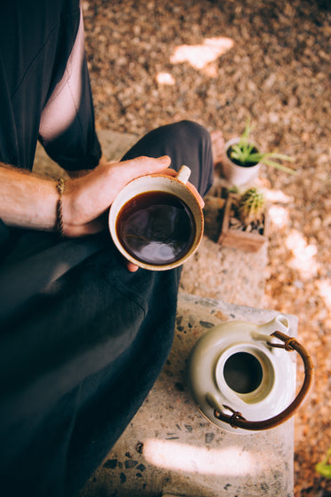 drinking black coffee with nature for company