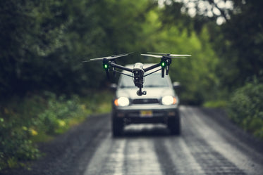 drone flying over road