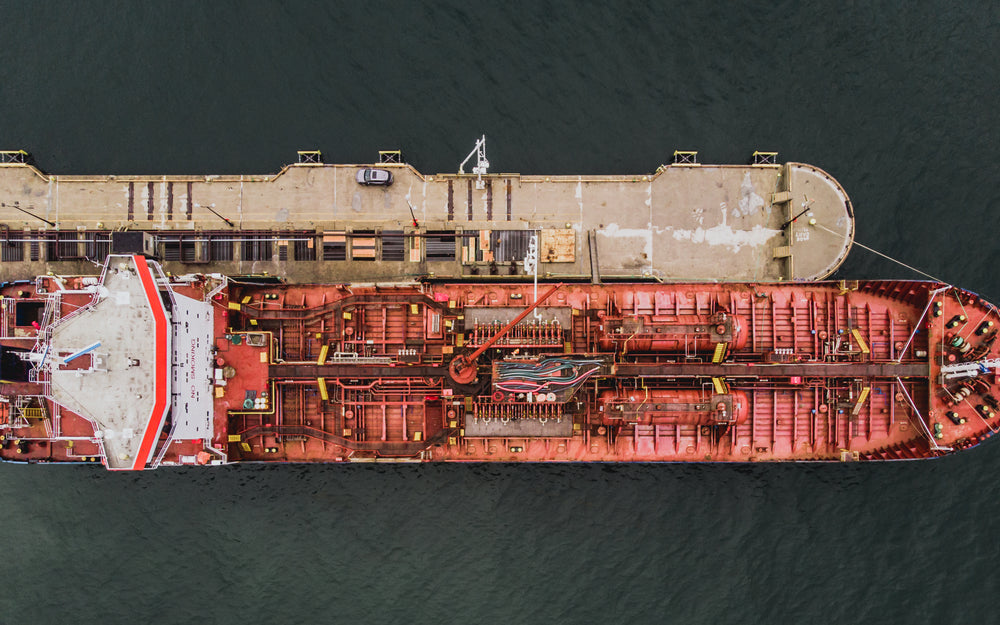drone view of the front of a docked ship