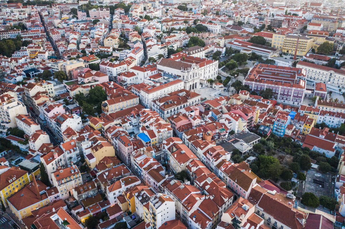 drones view of city sprawl of lisbon portugal
