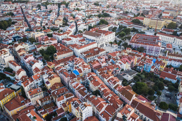 drones view of city sprawl of lisbon portugal