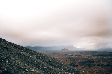 dry rocky landscape with low clouds