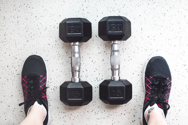 dumbbells and gym shoes