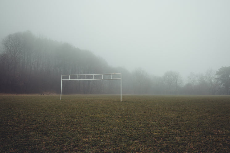 Eerie View Of A Foggy Soccer Field