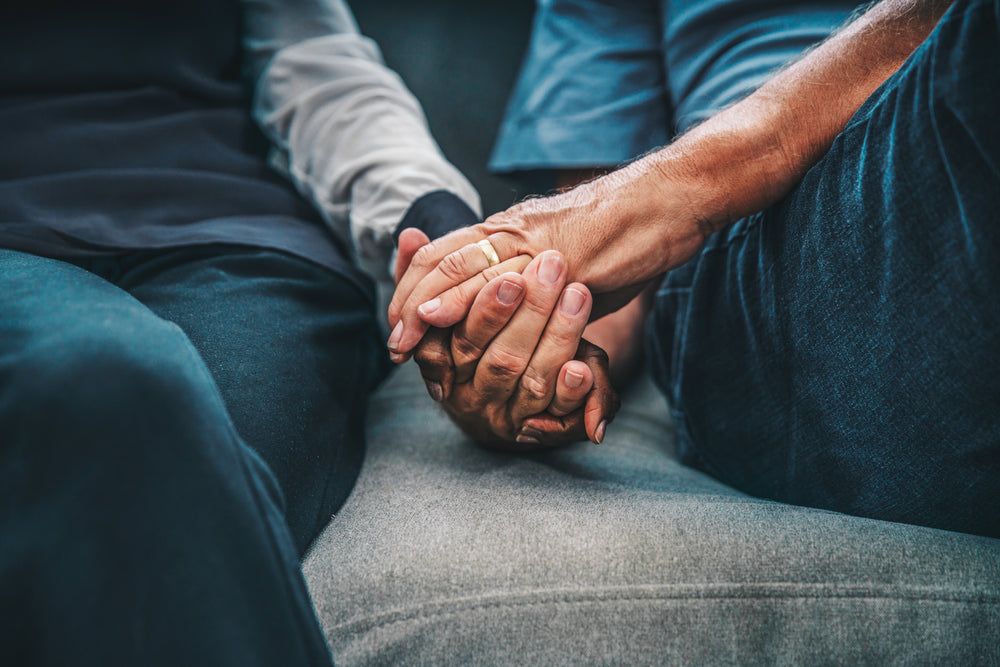 elderly hand holding