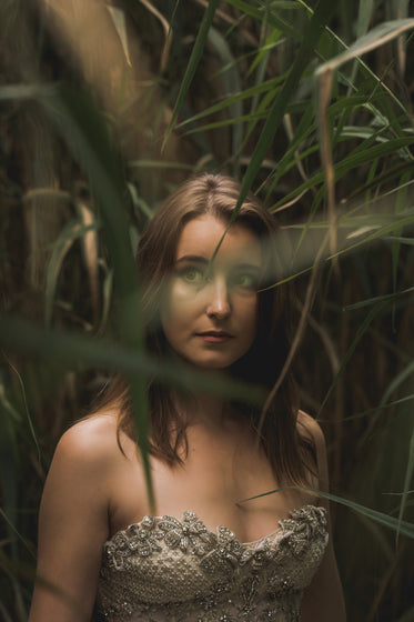 elegant woman in tall grass