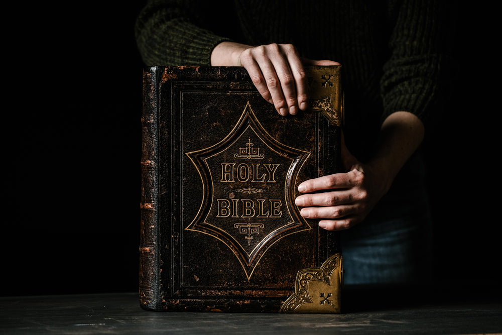 embossed leather bible held vertical