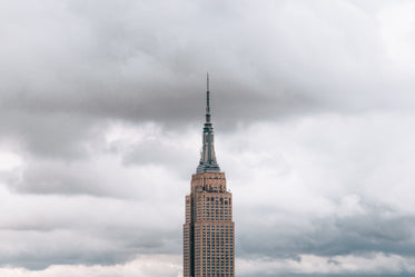 empire state top cloudy sky