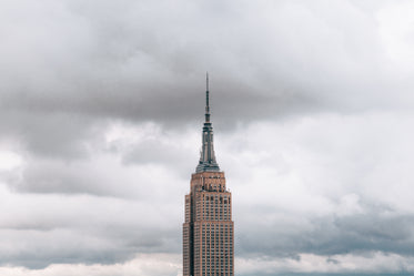 Free Stock Photo of Empire State Top Cloudy Sky — HD Images