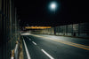 empty and enclosed highway at night