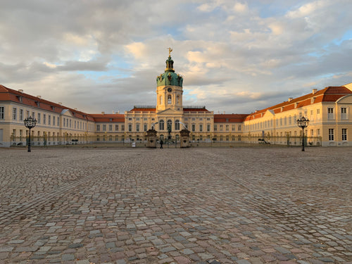 empty cobblestone courtyard to a palace