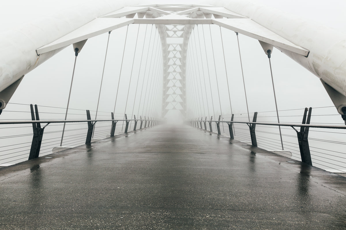 empty foggy pedestrian bridge
