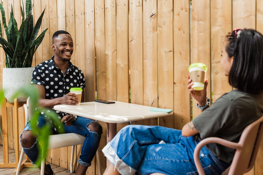 enjoying a coffee on a sunny patio