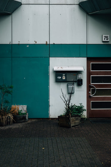 entrance to a green and white building