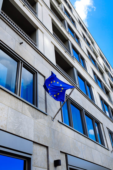 european flag on gray building