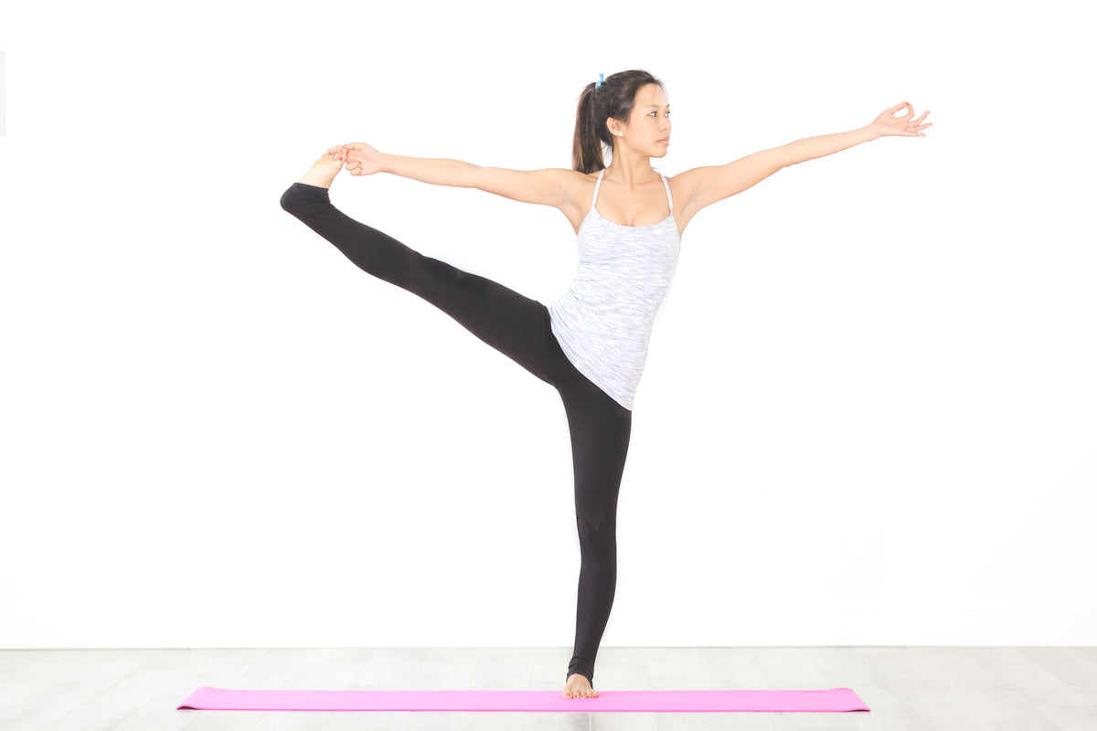 extended hand to toe pose yoga