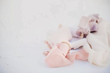 fabric and ribbons on white background