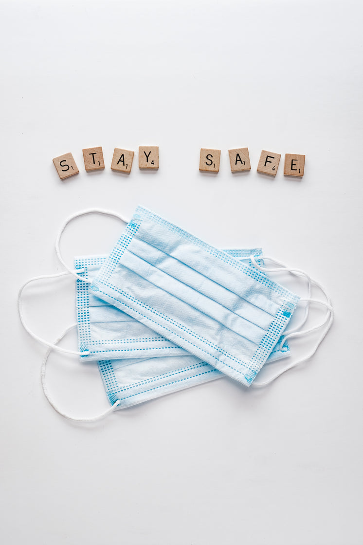 Face Masks And Letter Tiles Spelling Safe Hands